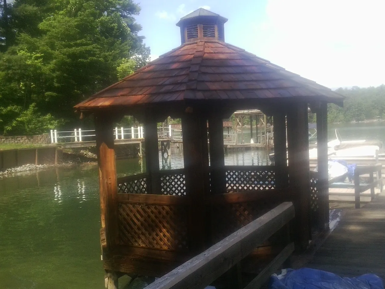 Cedar shake gazebo roof rebuilt on a lake dock in Atlanta